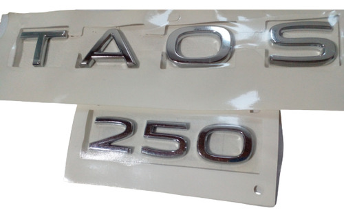 Insignia Emblema Vw Taos 250 Baul Cromado