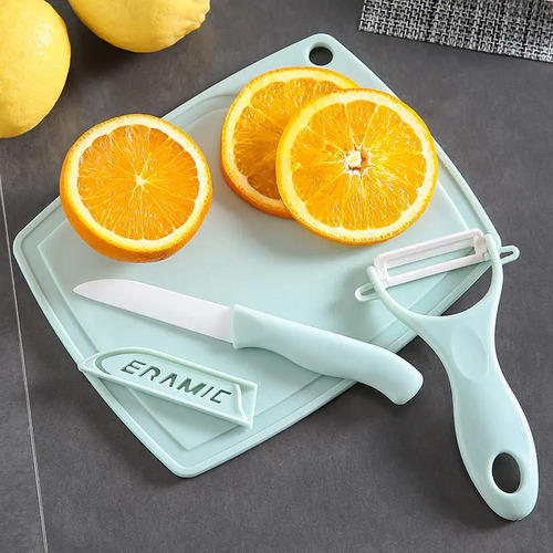 Cuchillo Y Pelador De Fruta Con Tabla De Picar