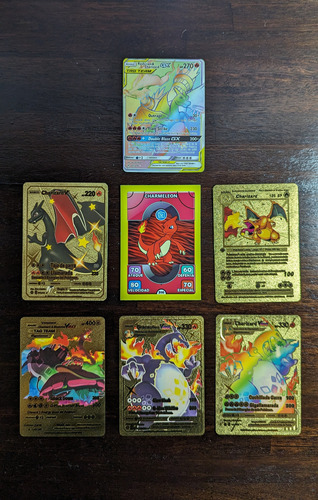 Tarjetas Pokémon Variadas Doradas Y Charizard Arcoiris