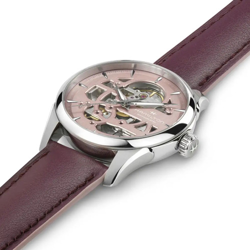 Reloj Hamilton Jazzmaster Skeleton Lady H32265870 Correa Violeta Bisel Plateado Fondo Rosa