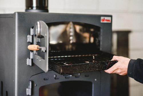Calefactor A Leña Qutral 19 Kw Con Horno
