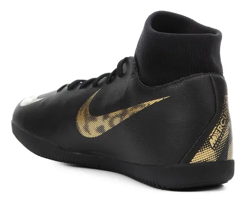Chuteira nike futsal hotsell preta e dourada