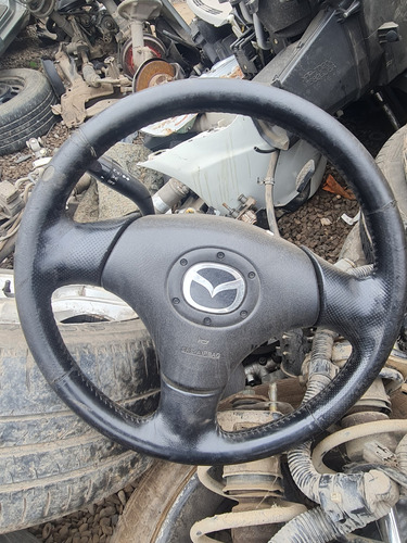 Volante Mazda 323
