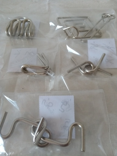 Imagem 3 de 4 de Kit Quebra Cabeça Metal 3d Enigma Com 8 Peças Steel Puzzles