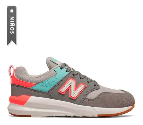 New balance top 009 gris niño
