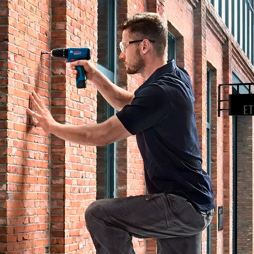 Taladro percutor atornillador inalámbrico de 10mm Bosch GSB 120-LI + 2 baterías de 2Ah + accesorio con maletín de transporte