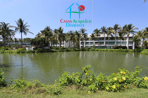 Cad Mayan Lakes 1-501. En Condominio Con Club De Playa. Terraza Con Vista A La Alberca Y Jardines
