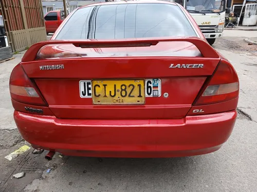 Mitsubishi Lancer 1.3 Gl 5 p