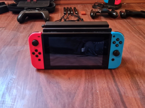 Nintendo Switch Neon V.2 Mas 2 Juegos Y 3 Controles