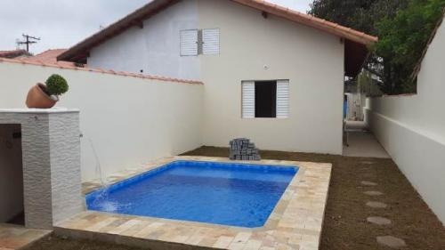Imagem 10 de 14 de Casa Geminada Com Piscina No Litoral Em Itanhaém! - 6989 Lc