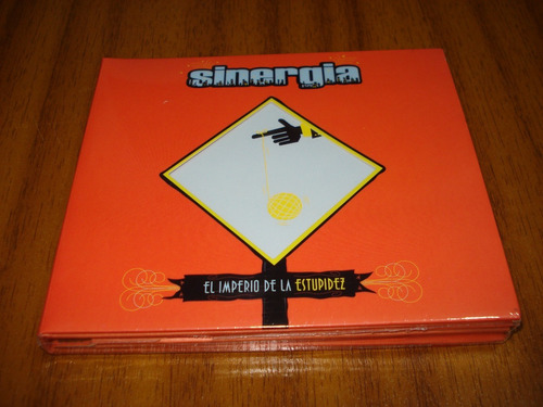 Cd+dvd Sinergia /el Imperio De La Estupidez (nuevo Y Sellado