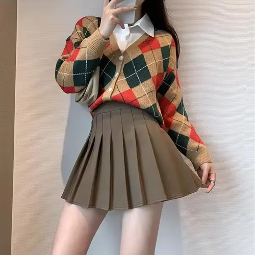 . Elegante De Falda Plisada A Color Sólido Tableada Con