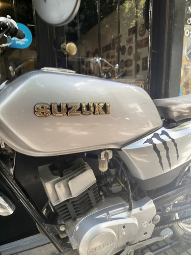 Suzuki Ax 100