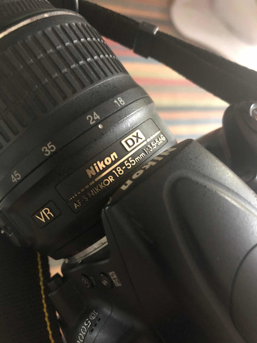 Nikon D5000 + Lente