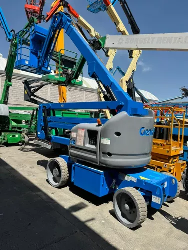 Plataforma elevatória articulada com rodas - Z-45 XC - Genie - a diesel /  para terrenos acidentados