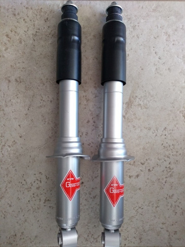 Amortiguadores Kyb Gas A-just Toyota Tacoma 4x4 De 1995-2004