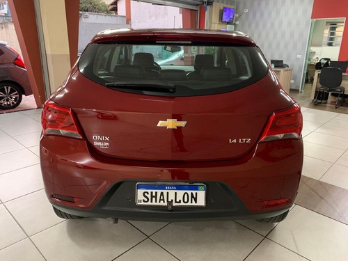 Imagem 3 de 12 de Chevrolet Onix 1.4 Ltz 5p 2018/2019 Vermelho