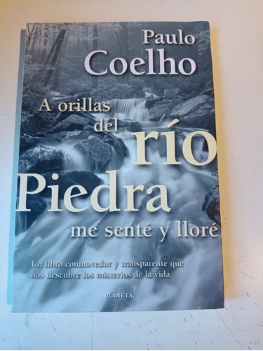 A Orillas Del Río Piedra Me Sente Y Lloré P. Coelho