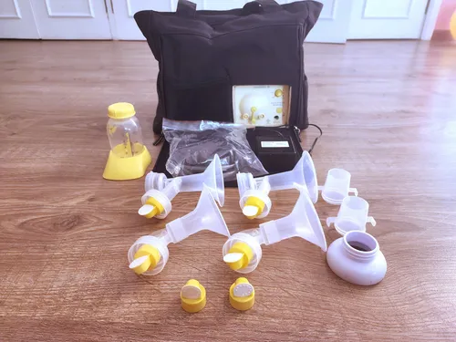comprar Extractor De Leche Materna Marca Medela, Bolso Tipo Cartera