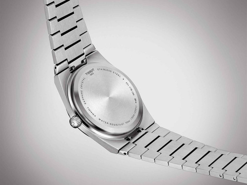 Reloj pulsera Tissot T1374101109101 con correa de acero inoxidable color gris - fondo azul