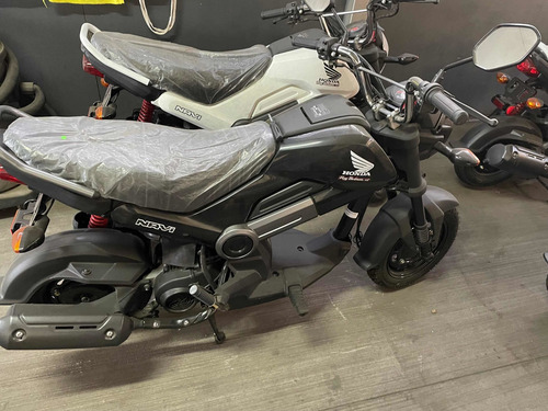 Imagen 4 de 16 de Honda Navi 110cc Maletera