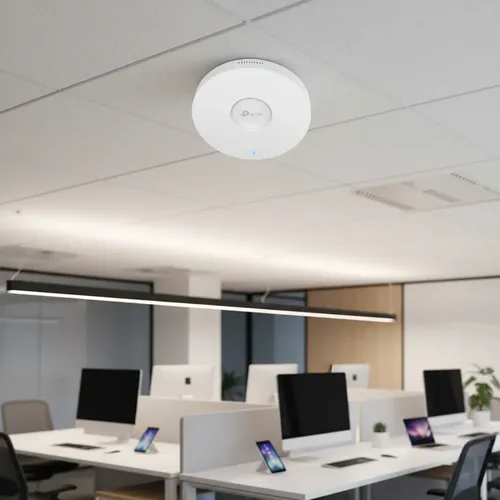 Commercial ceiling mounted Wi-Fi access point in a modern office