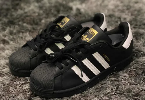 Tenis adidas negro con dorado new arrivals