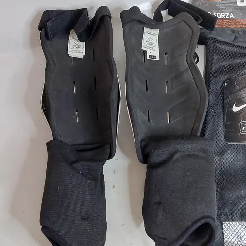 Espinilleras nike t90 hot sale