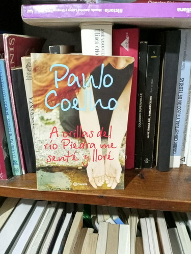 A Orillas Del Rio Piedra Me Sente Y Llore- Paulo Coelho