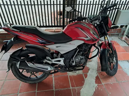 Discover 125 St, Motocicleta