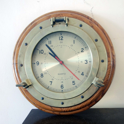 Reloj De Bronce Y Madera En Forma De Claraboya Marina