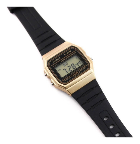 Imagen 2 de 3 de Reloj pulsera Casio Collection F-91 de cuerpo color dorado, digital, fondo dorado, con correa de resina color negro, dial negro, minutero/segundero negro, bisel color negro y hebilla simple