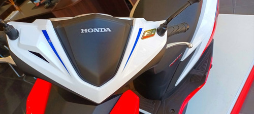 Imagen 6 de 16 de Honda Elite 125 Fi Tricolor Honda Redbikes