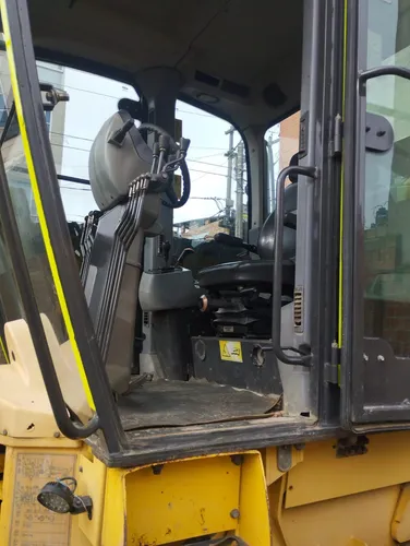 Motoniveladora Newholland 170b