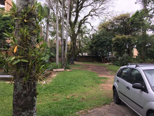 Casa Em Tristeza Com 4 Dormitórios - Vz4048