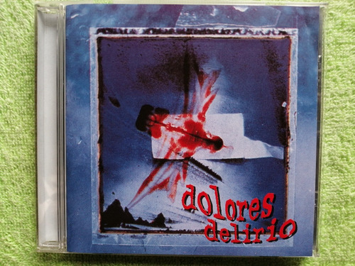 Eam Cd Dolores Delirio Bajo Un Envenenado Cielo Plateado 97