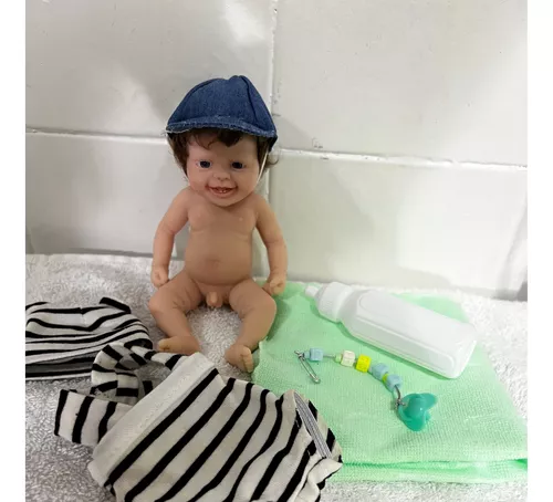 Mini bebê reborn silicone sólido 9cm + bercinho