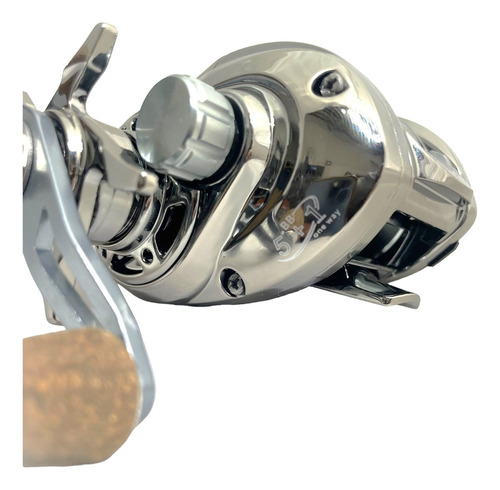 Reel Rotativo Huevito Amberjack Dynamo 201 6 Rululemanes 6.3:1 Freno 8 Kg Plateado Lado de la manija Izquierdo