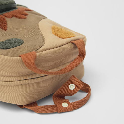 R, Una Mochila Bordada En Forma Sol Con Diseño Dinosaurio