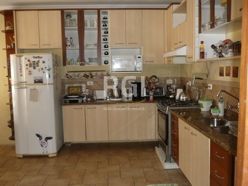 Casa Em Tristeza Com 3 Dormitórios - Mi9980