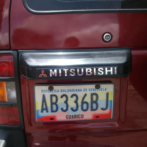 Emblema Mitsubishi Montero Dakar Cromo Relieve Porta Placas