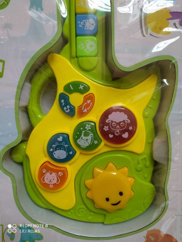 Imagen 3 de 3 de Guitarra Dinosaurio Bebé Niño Juguete Musical Y Luz Interact