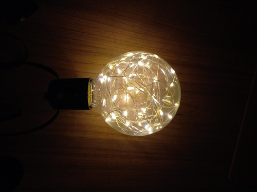 Imagen 4 de 4 de Bombillo Vintage Led Globo Tipo Luciernaga Color De La Luz Amarillo