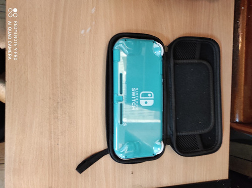 Nintendo Switch Lite + 3 Juegos