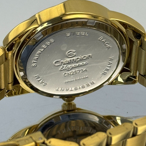 Relógio De Pulso Analogico Champion Dourado +bolsa Colorida Fundo Branco