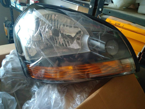 Imagen 2 de 3 de Faro Hyundai Tucson + 2009 Derecho Fondo Negro