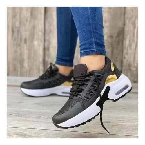 Tenis nike negro con dorado mujer hotsell