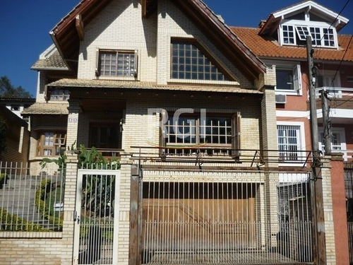 Casa Em Tristeza Com 3 Dormitórios - Mi9980