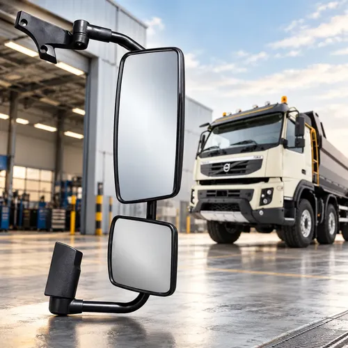Retrovisor completo de Volvo FMX em primeiro plano e caminhão FMX ao fundo