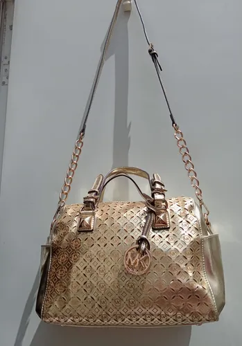 Bolsa michael kors dorada original hotsell